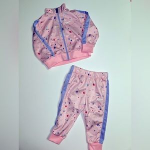 Baby girl Nike warm up set. Pink/purple pebble pattern size 12m